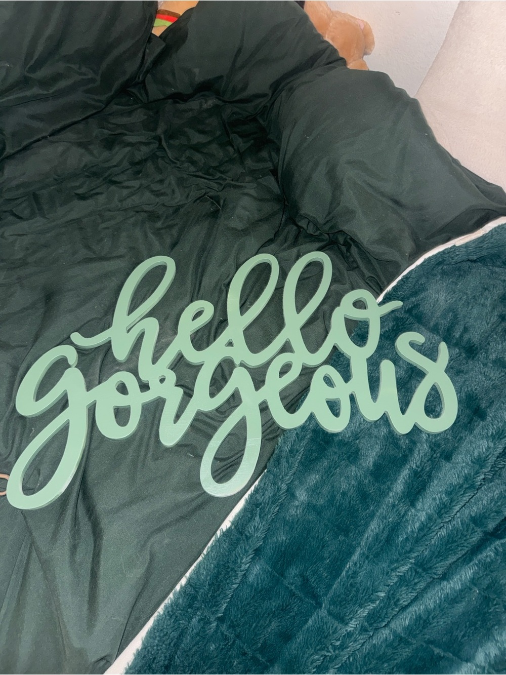Sage green “hello beautiful” wall decor sign